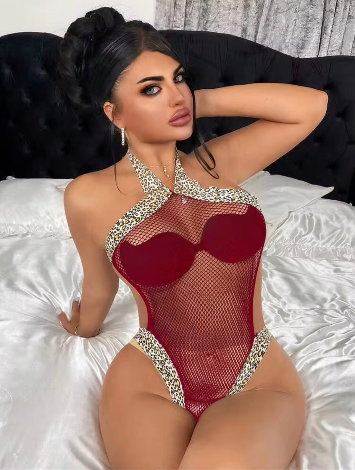 RUBY REBEL
"Some rules look better broken." Fishnet Bodysuit