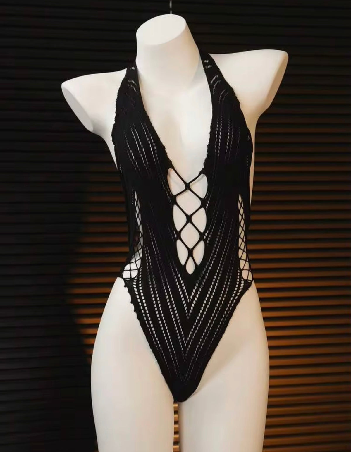 PLOT TWIST
"Wait until you see the back." Plunge Cutout Bodysuit